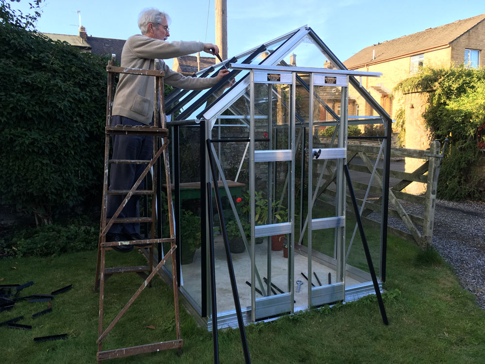 Steve putting together his greenhouse